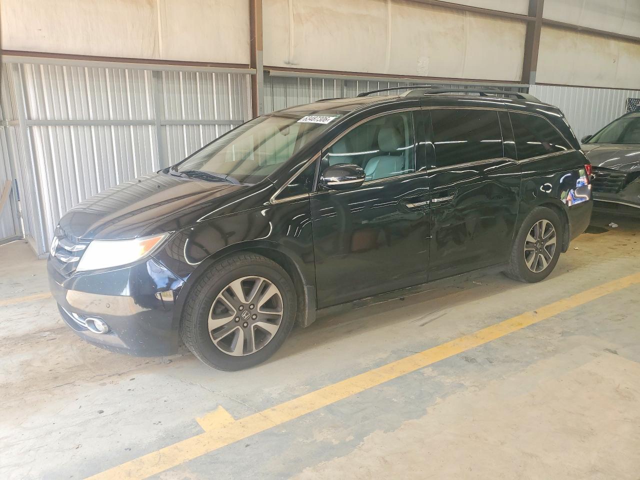 2014 Honda Odyssey Touring, VIN 5FNRL5H91EB008342 — Side