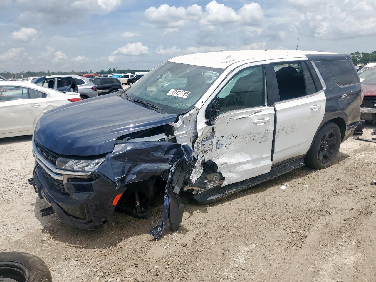 2022 Chevrolet Tahoe Commercial, VIN 1GNSCLED8NR314566 — Side