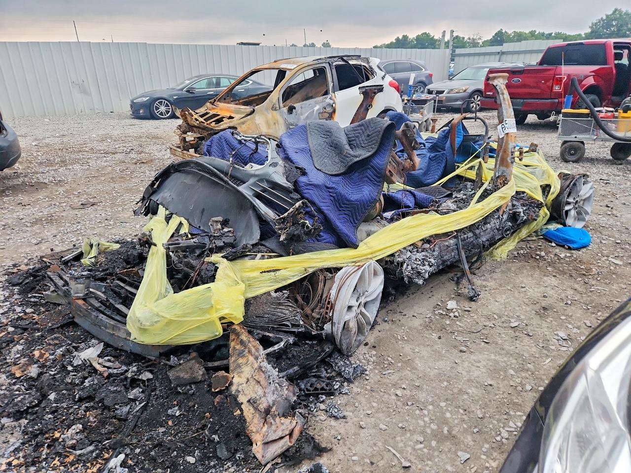 2012 Tesla Model S, VIN 5YJSA1DN2CFP01615 — Burn