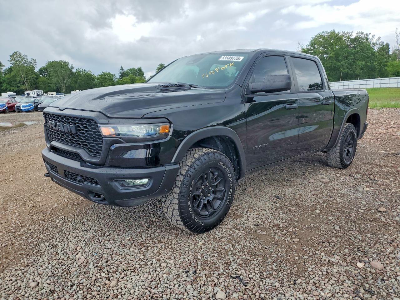 2025 Ram 1500 Rebel, VIN 1C6SRFLP4SN606313 — Бок