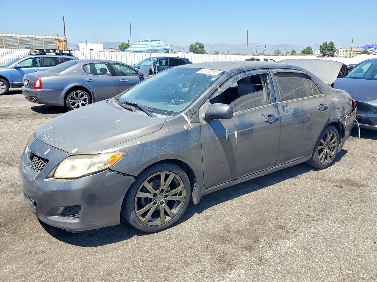 2009 Toyota Corolla LE, VIN JTDBL40E39J023430 — Rear end