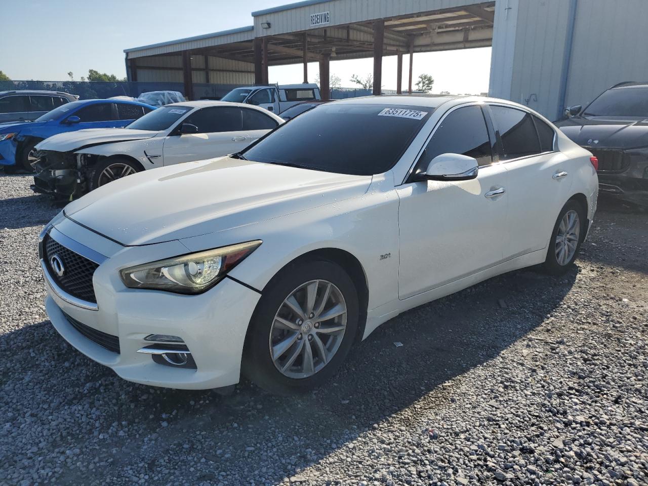 2017 Infiniti Q50 Premium, VIN JN1EV7AR0HM831261 — Side