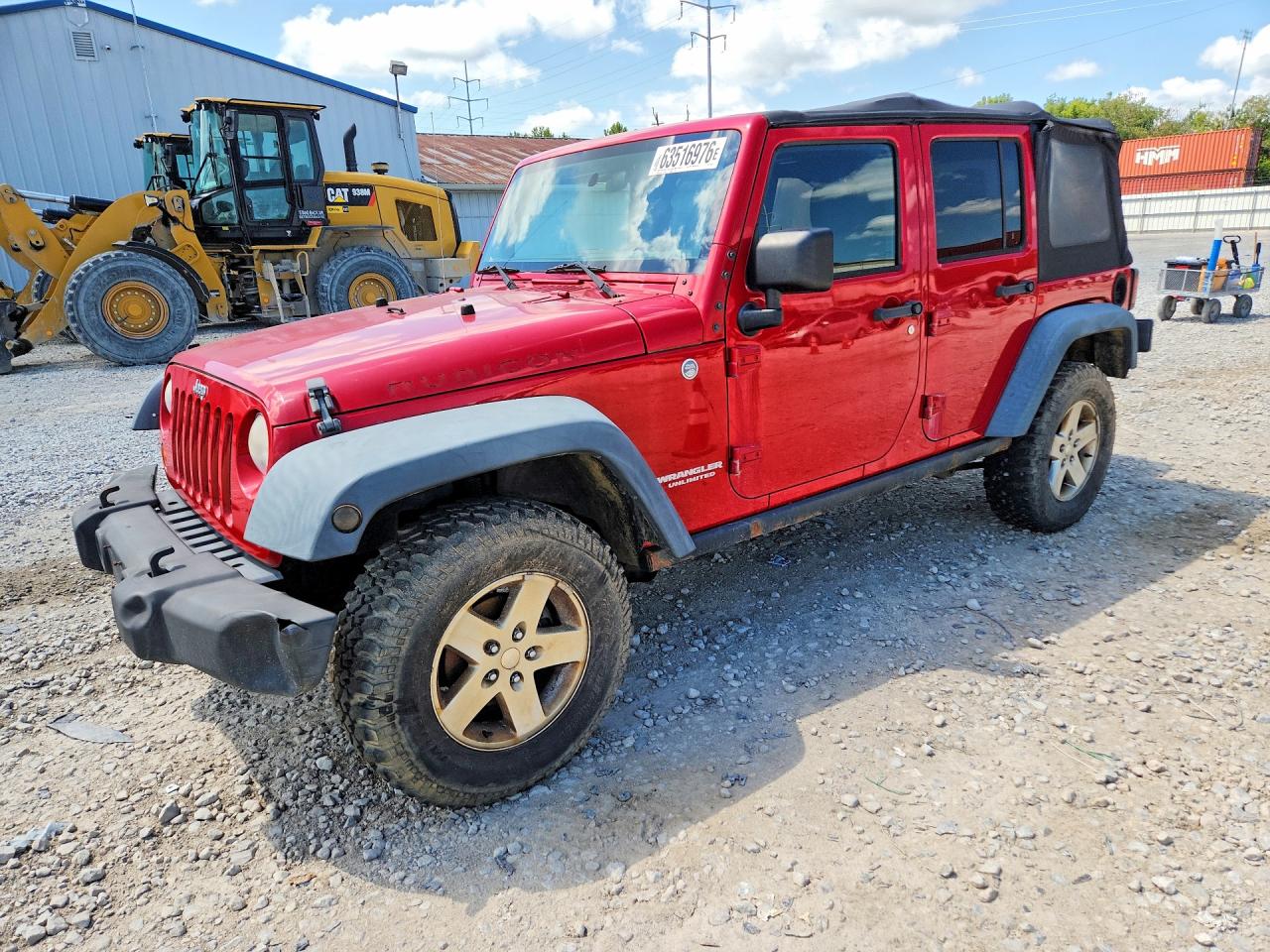 2011 Jeep Wrangler Unlimited Rubicon, VIN 1J4BA6H18BL559619 — Water / flood