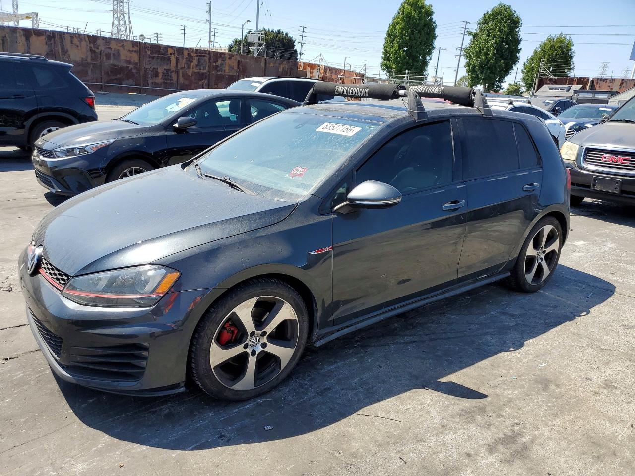 2015 Volkswagen Golf GTI S, VIN 3VW4T7AU8FM033642 — Side