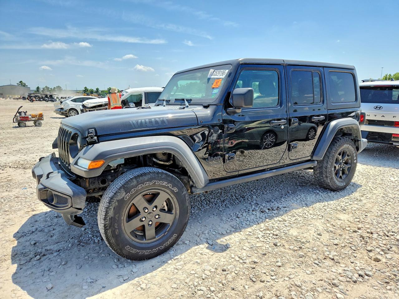 2021 Jeep Wrangler Unlimited Freedom, VIN 1C4HJXDN2MW552598 — Vandalism