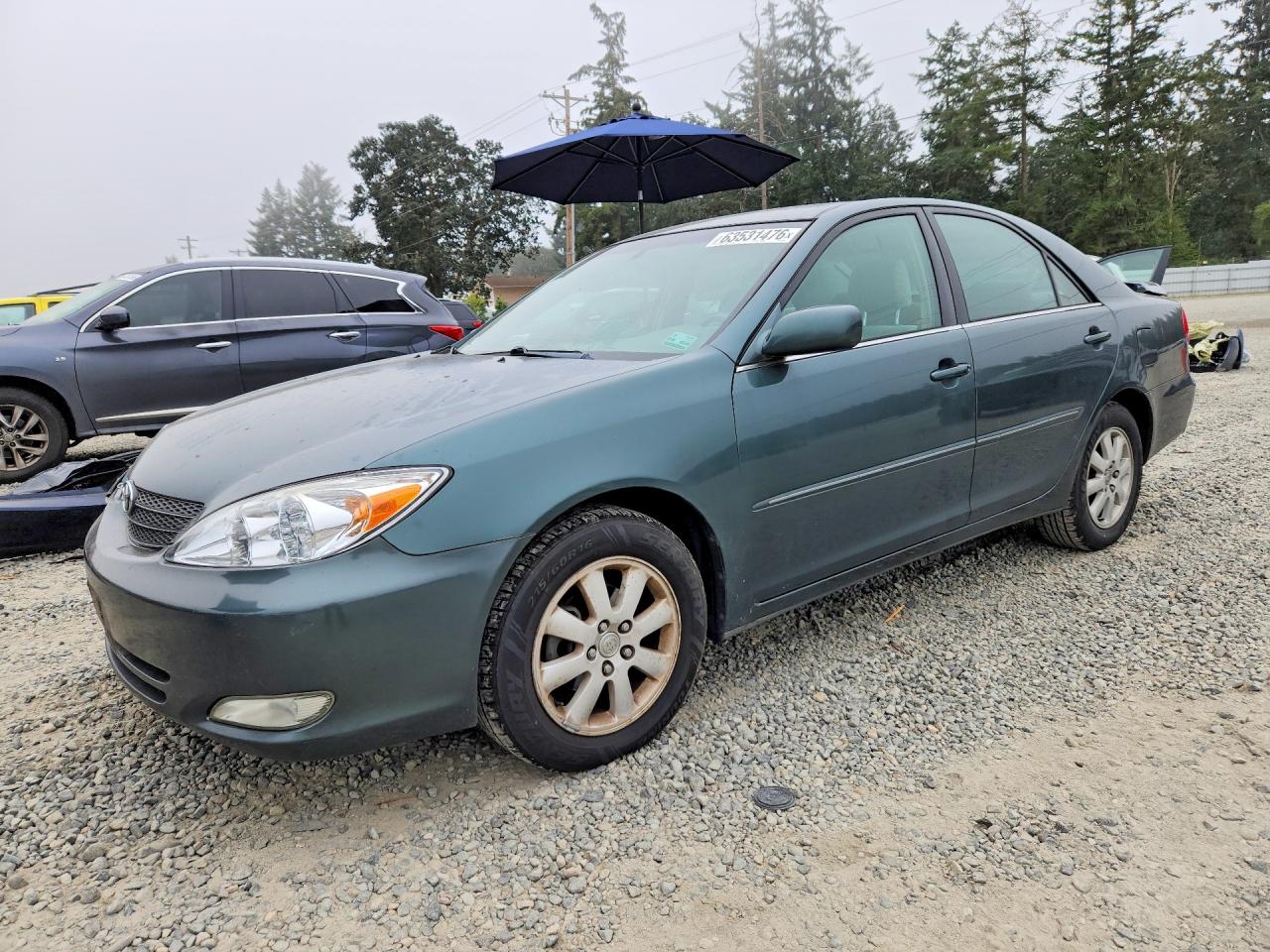 2004 Toyota Camry LE, VIN 4T1BE32KX4U372157 — Front end