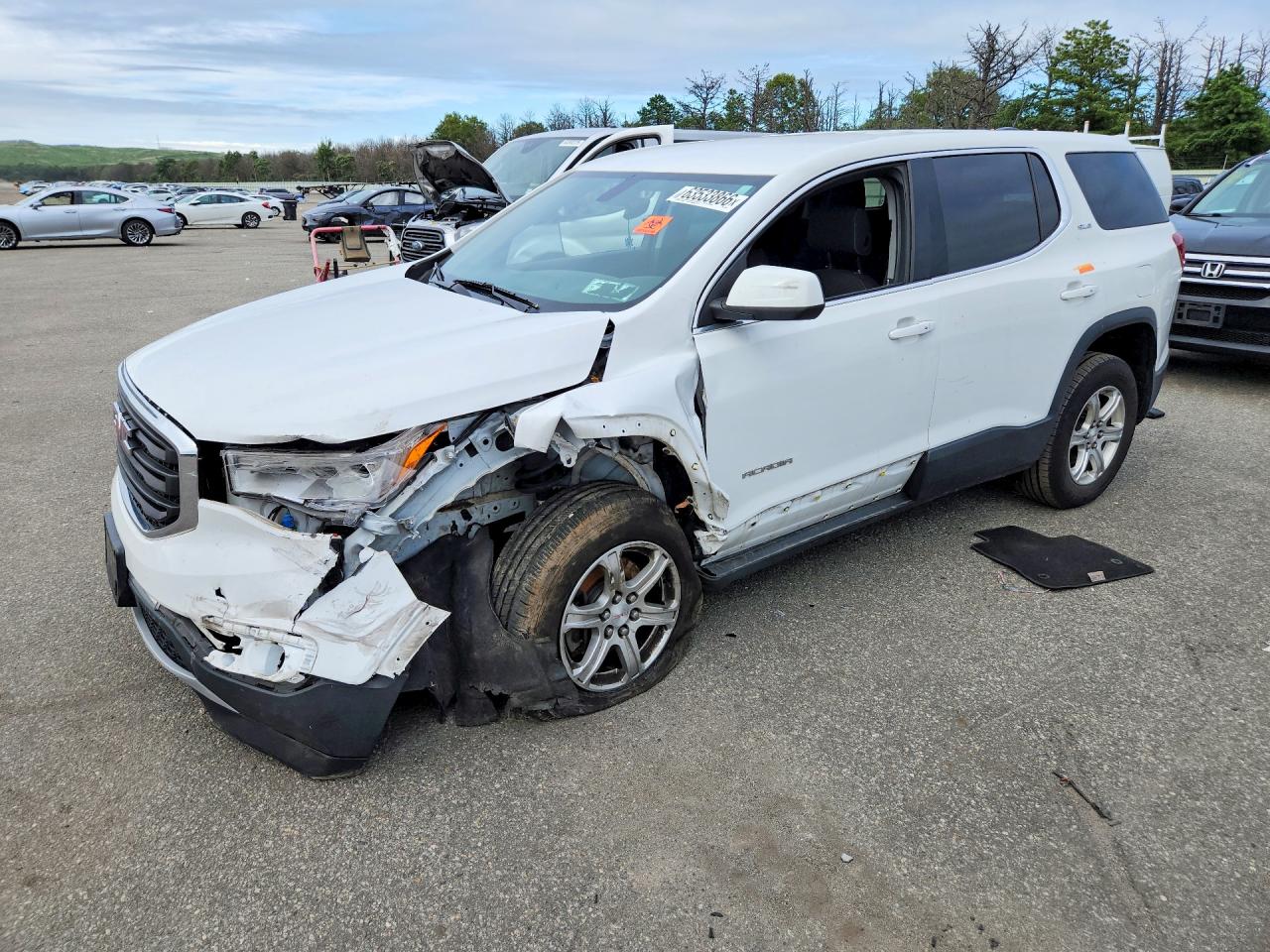 2019 GMC Acadia SLE, VIN 1GKKNRLA0KZ124680 — Front end