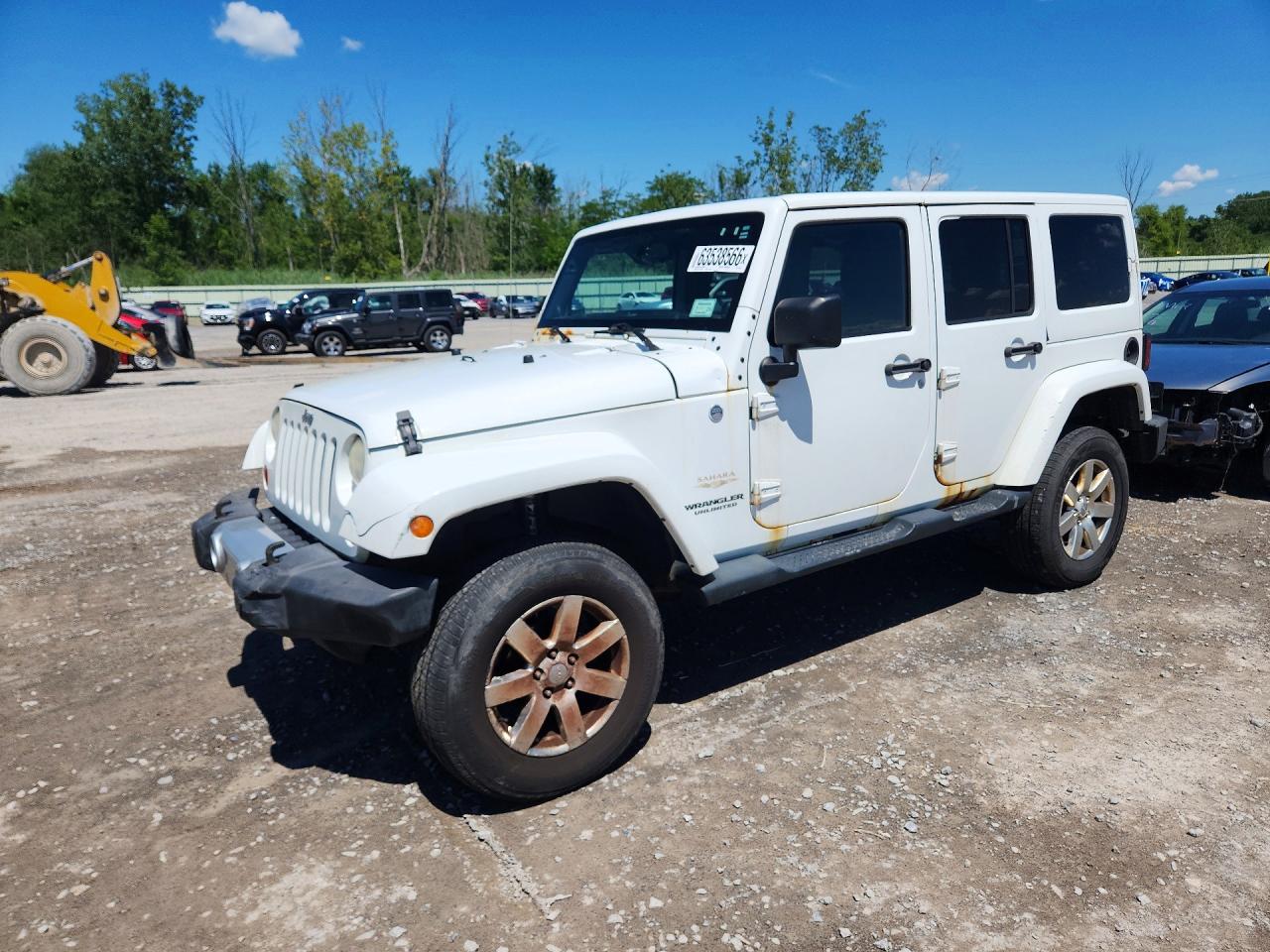 2013 Jeep Wrangler Unlimited Sahara, VIN 1C4BJWEG2DL595145 — Undercarriage