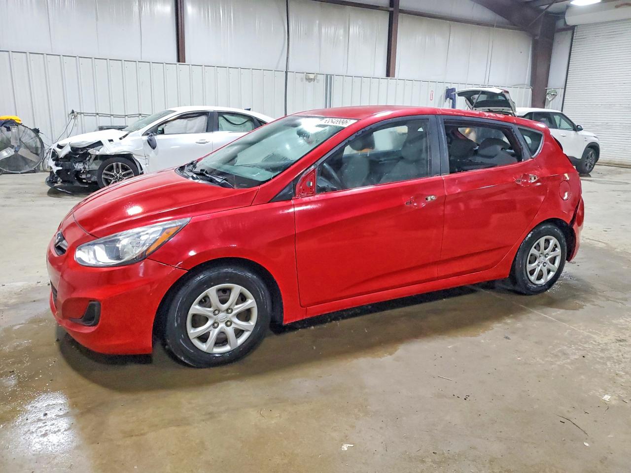 2014 Hyundai Accent GS, VIN KMHCT5AE1EU142736 — Vandalism