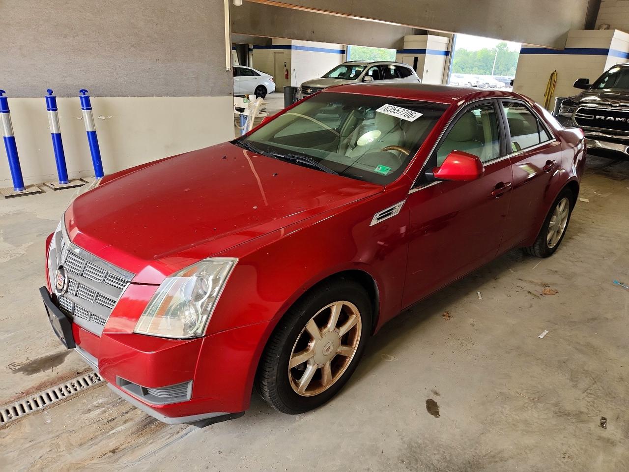 2009 Cadillac CTS RWD, VIN 1G6DF577690141378 — Бок