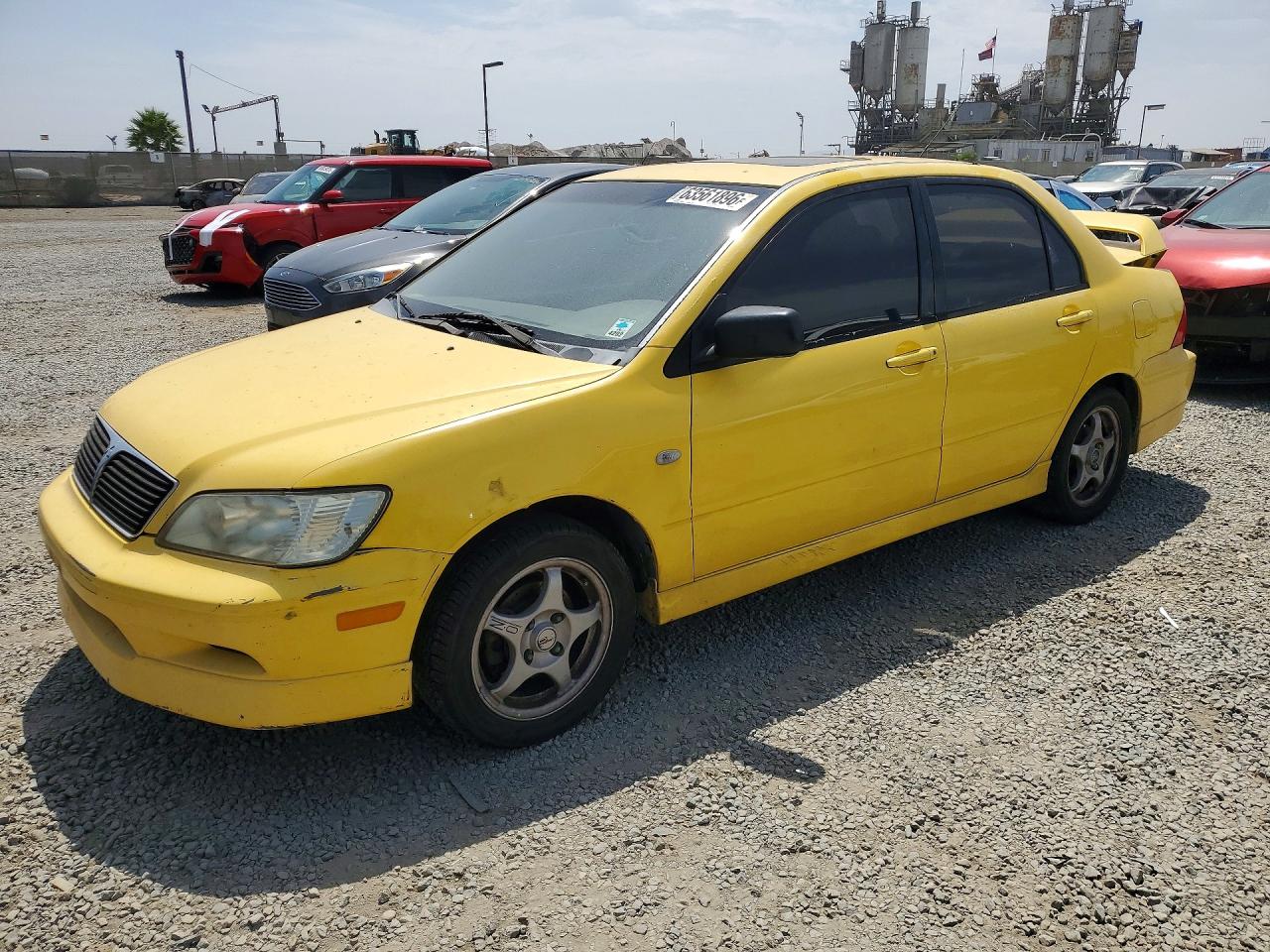 2003 Mitsubishi Lancer OZ-Rally, VIN JA3AJ86E53U094522 — Бок
