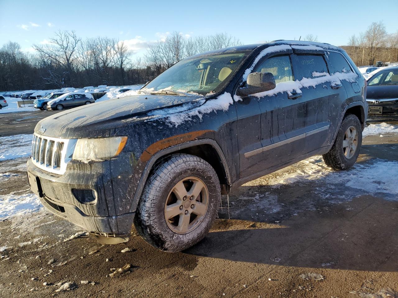 2011 Jeep Grand Cherokee Laredo, VIN 1J4RR4GGXBC669413 — Normal wear