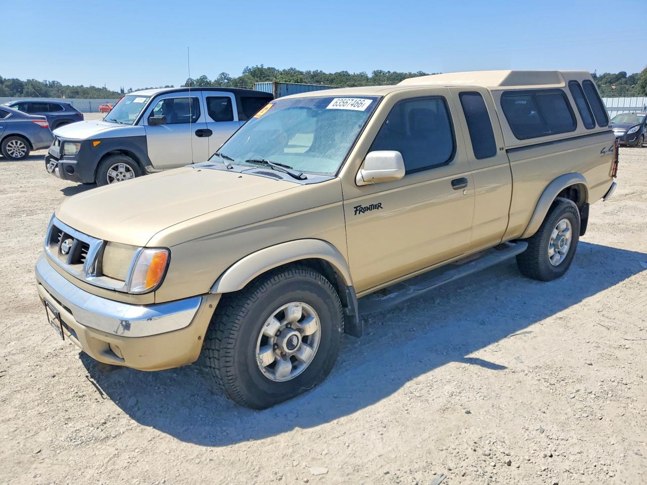 1999 Nissan Frontier XE, VIN 1N6ED26YXXC306986 — Minor dents and scratches