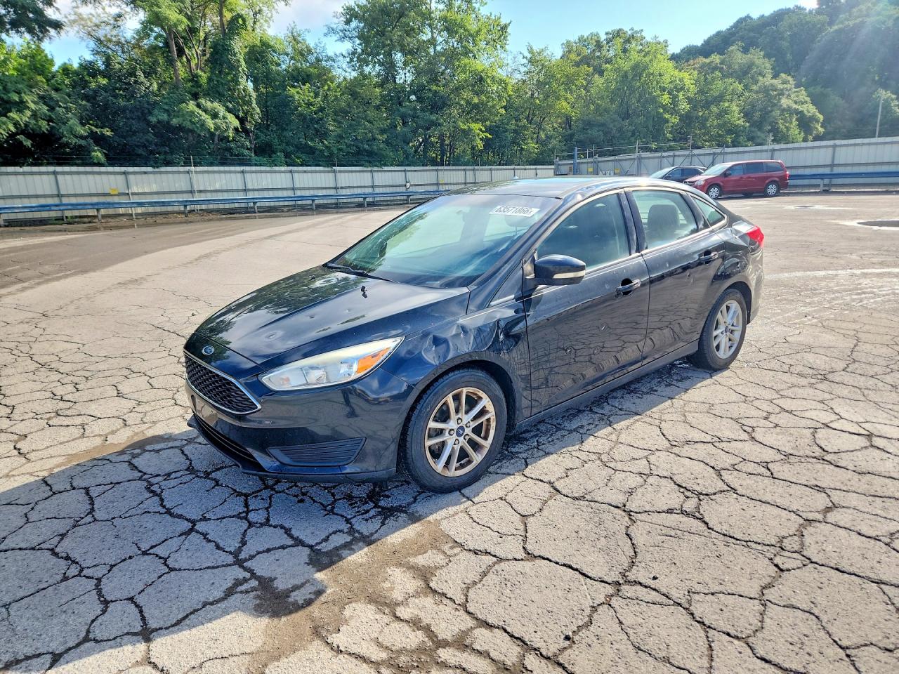 2015 Ford Focus SE, VIN 1FADP3F27FL217016 — Vandalism