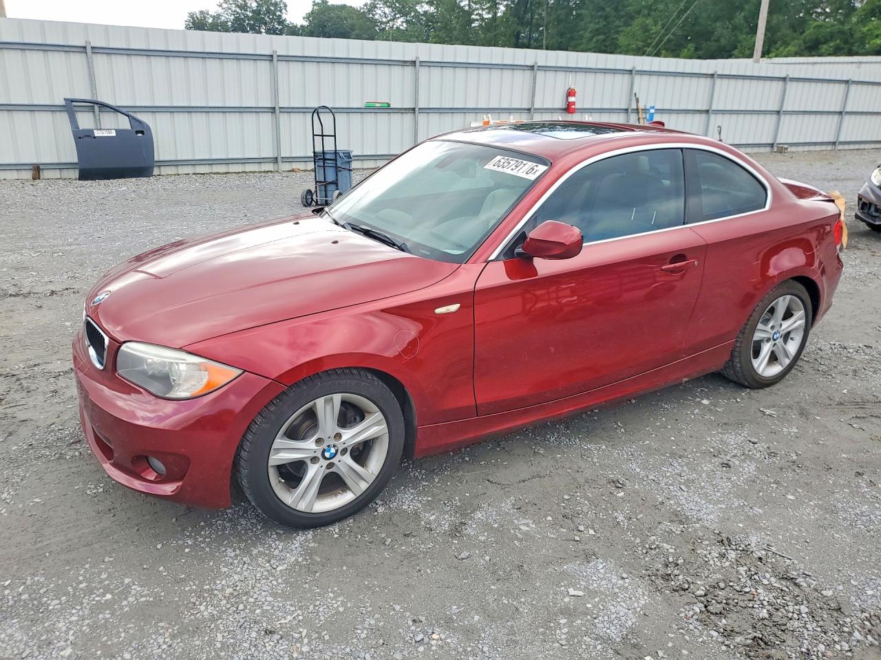 2012 BMW 1 Series 128i, VIN WBAUP7C54CVP22685 — Side