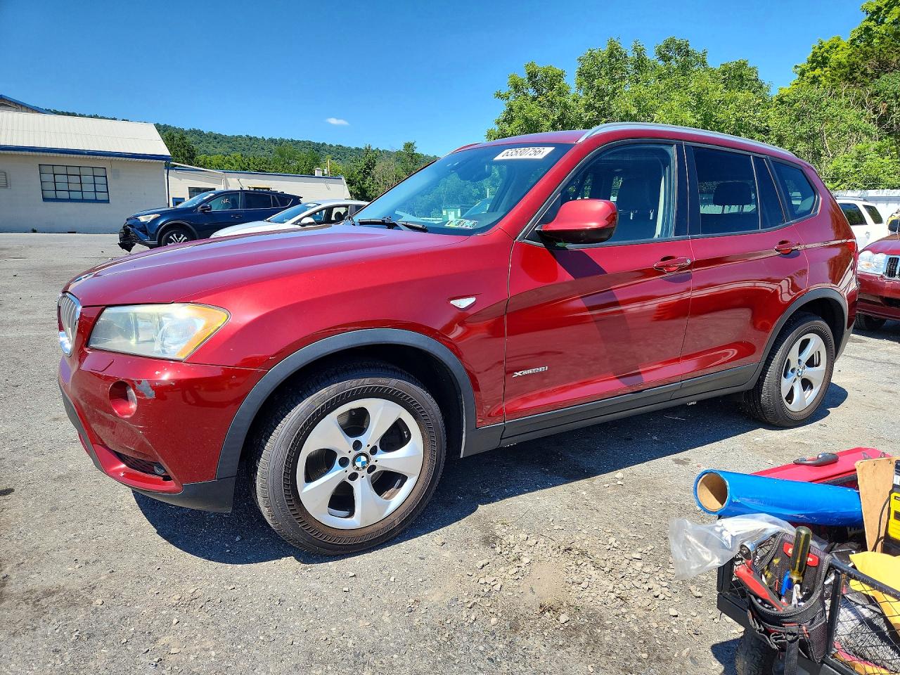 2011 BMW X3 28i, VIN 5UXWX5C57BL704741 — Side