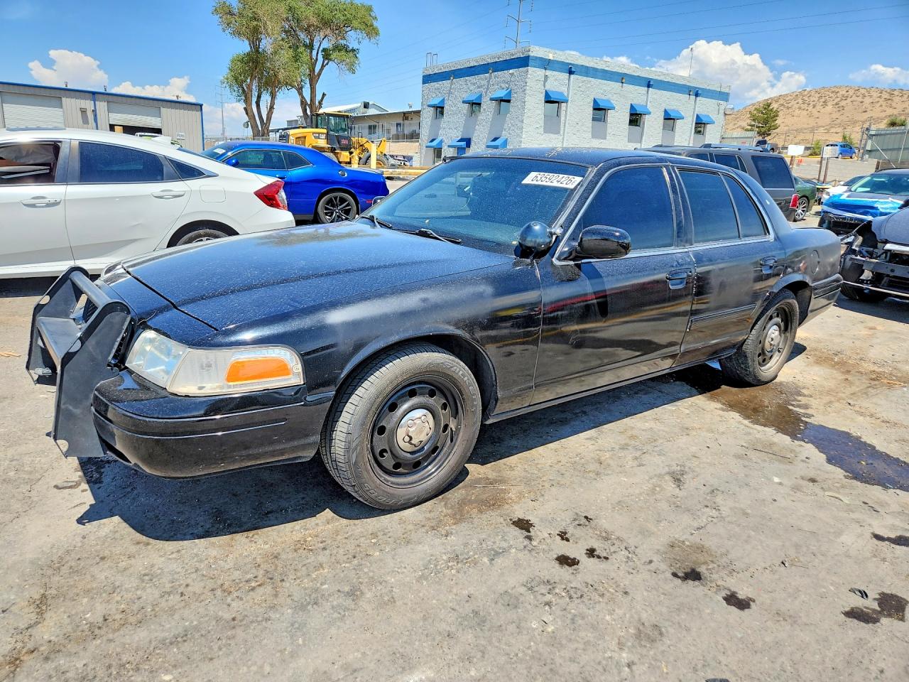 2009 Ford Police Interceptor, VIN 2FAHP71V59X122844 — Зад