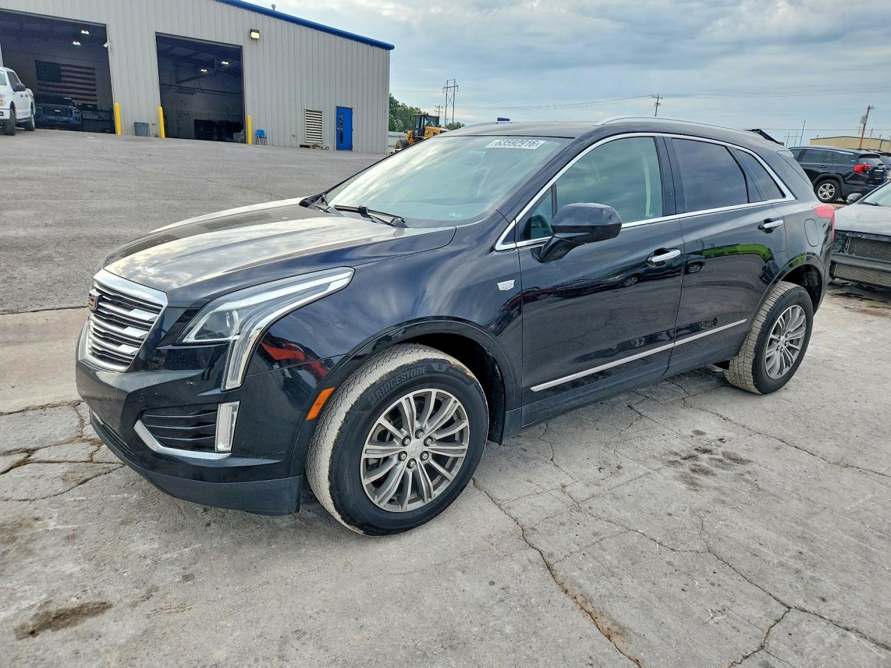 2017 Cadillac XT5 Luxury AWD, VIN 1GYKNDRS5HZ124286 — Normal wear