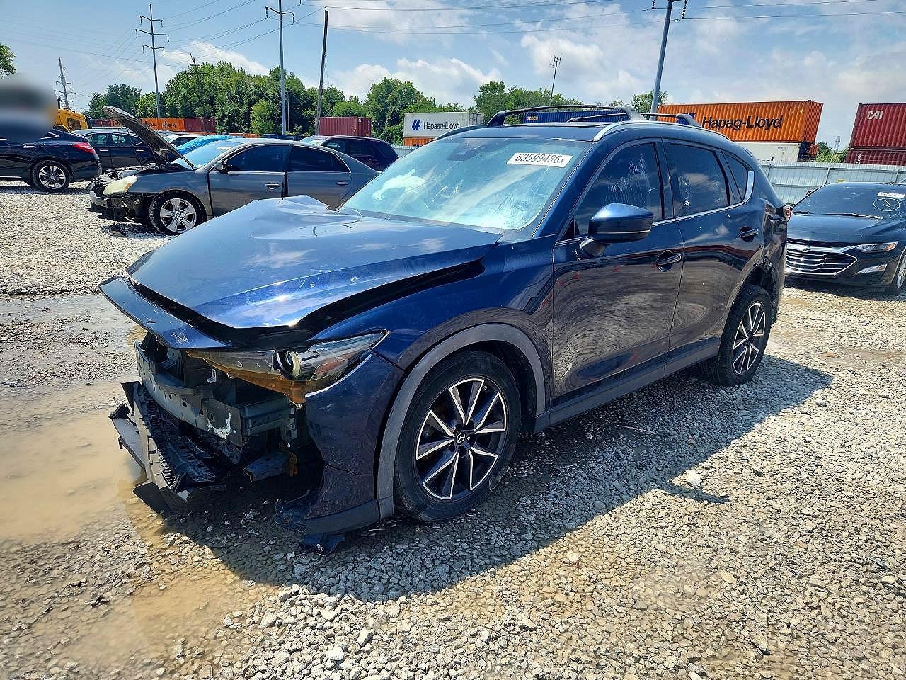 2017 Mazda CX-5 Grand Touring, VIN JM3KFBDL1H0167624 — Front end