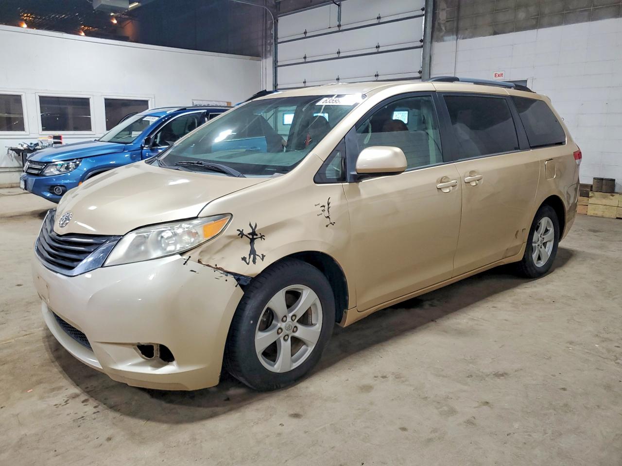 2011 Toyota Sienna LE, VIN 5TDKK3DCXBS062658 — Interior fire