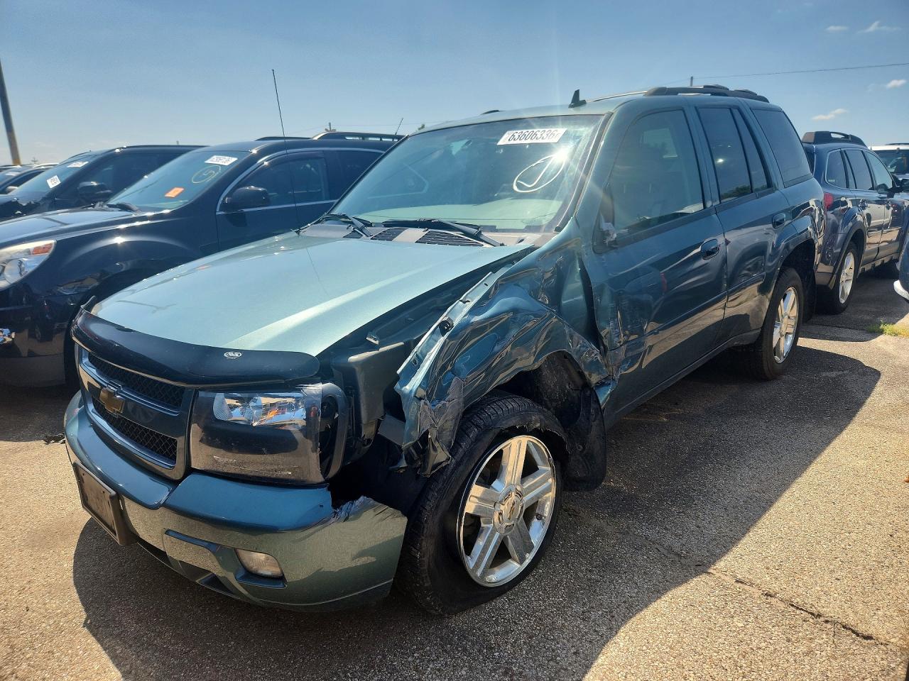 2009 Chevrolet TrailBlazer 3LT, VIN 1GNDT33S792130745 — Бок