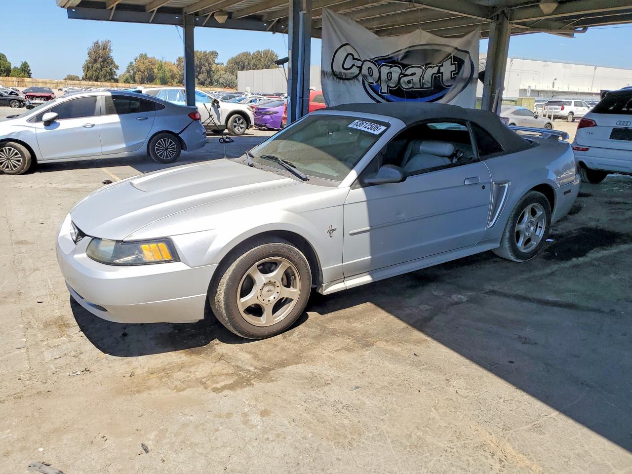 2003 Ford Mustang Deluxe, VIN 1FAFP44453F407796 — Side