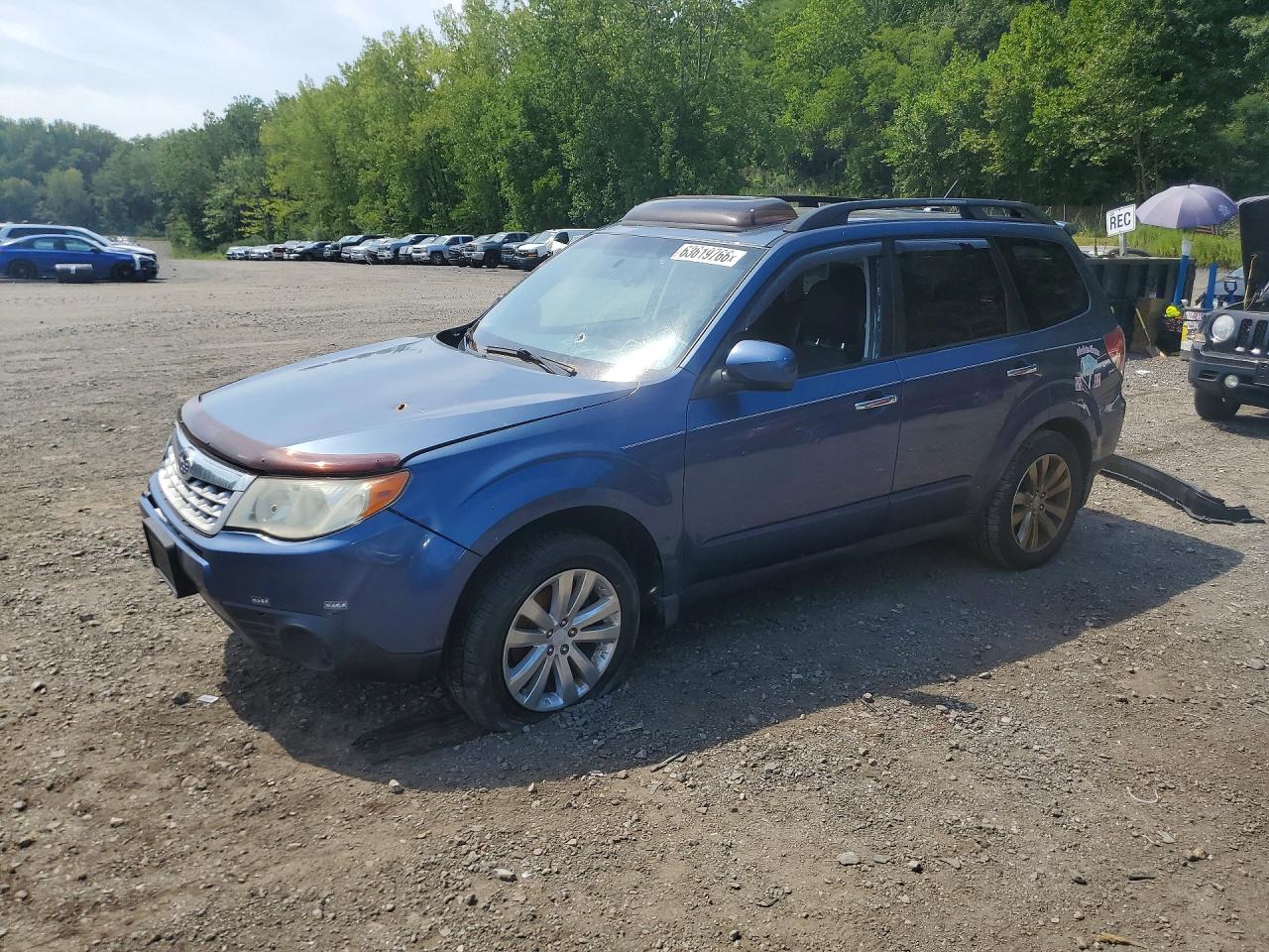 2011 Subaru Forester X Premium, VIN JF2SHADC0BH731142 — Front end