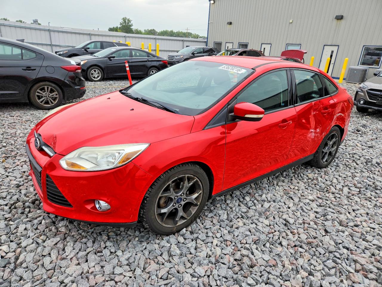 2014 Ford Focus SE, VIN 1FADP3F2XEL318176 — Бок