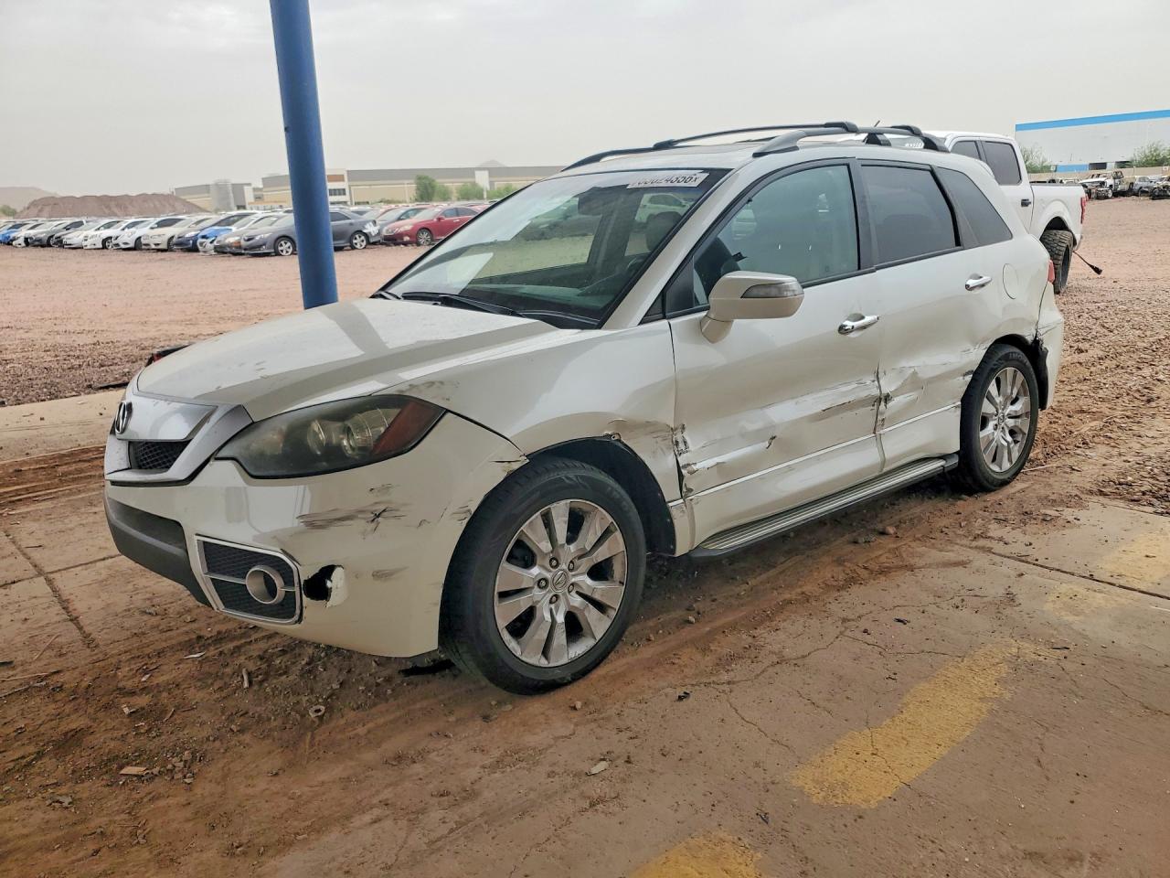 2011 Acura RDX, VIN 5J8TB1H26BA000022 — Side