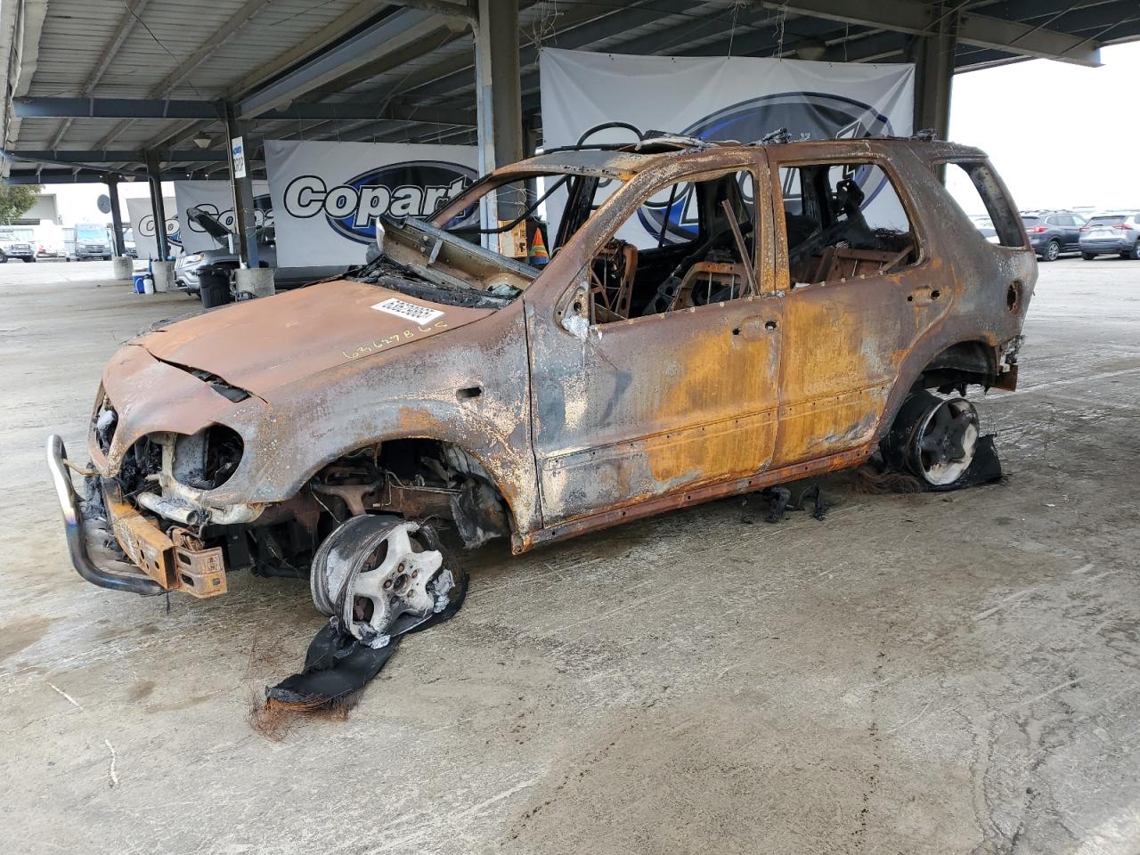 1998 Mercedes-Benz M 320/430/500, VIN 4JGAB54E6WA019944 — Interior fire
