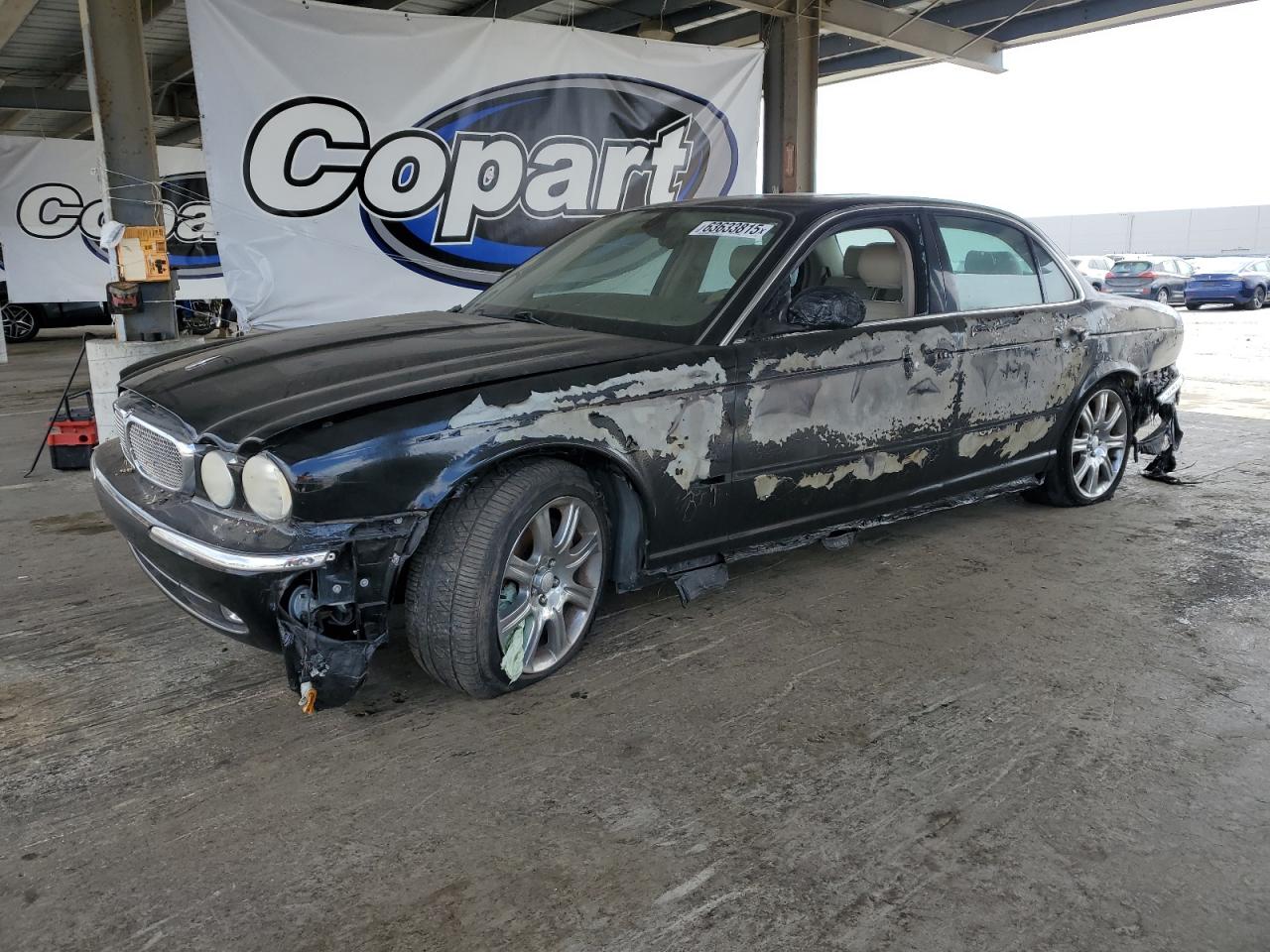 2004 Jaguar XJ 8, VIN SAJWA71C14SG19603 — Пожар