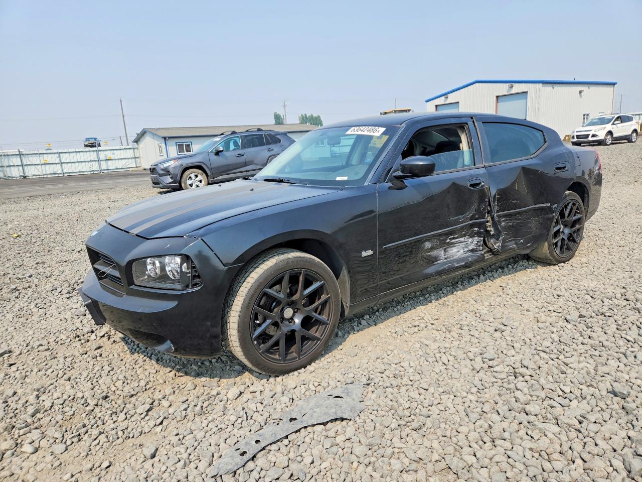 2010 Dodge Charger SXT, VIN 2B3CA3CV5AH222423 — Side