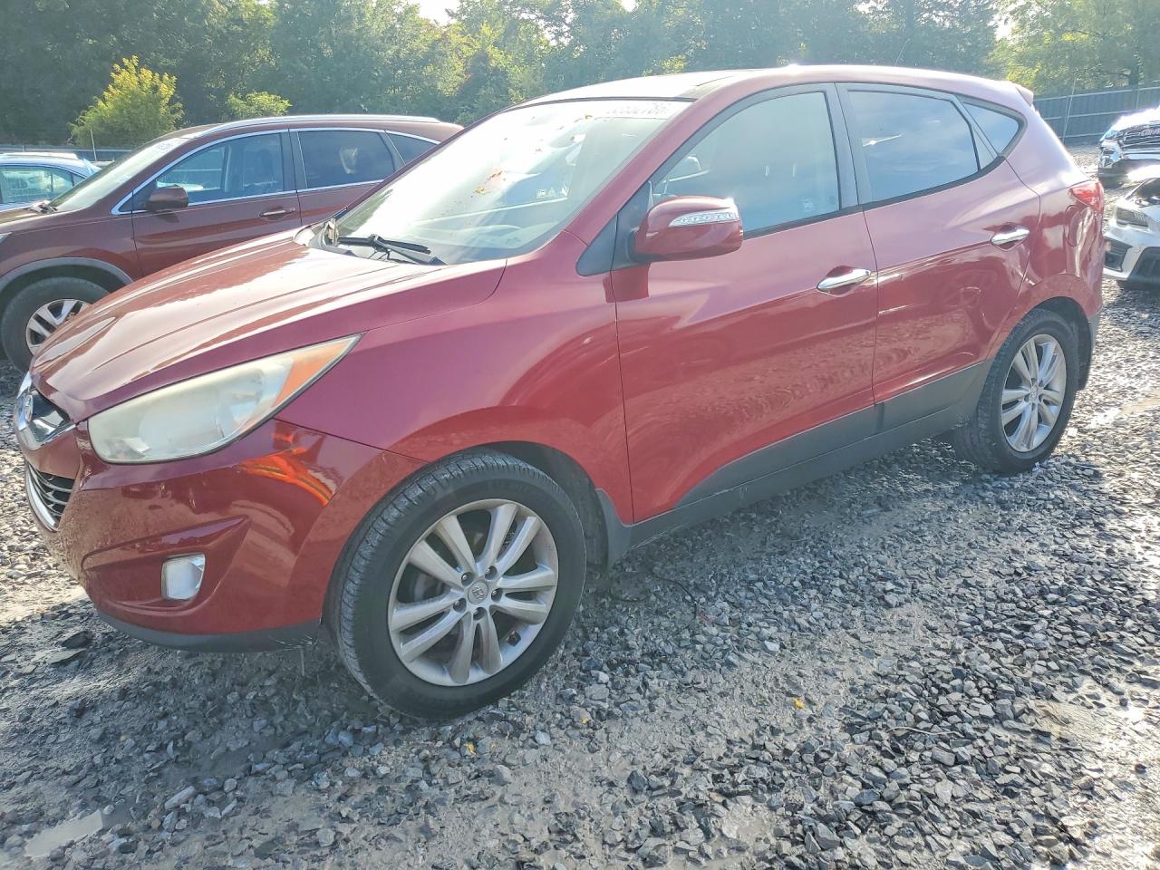 2011 Hyundai Tucson Limited, VIN KM8JU3AC6BU170440 — Front end
