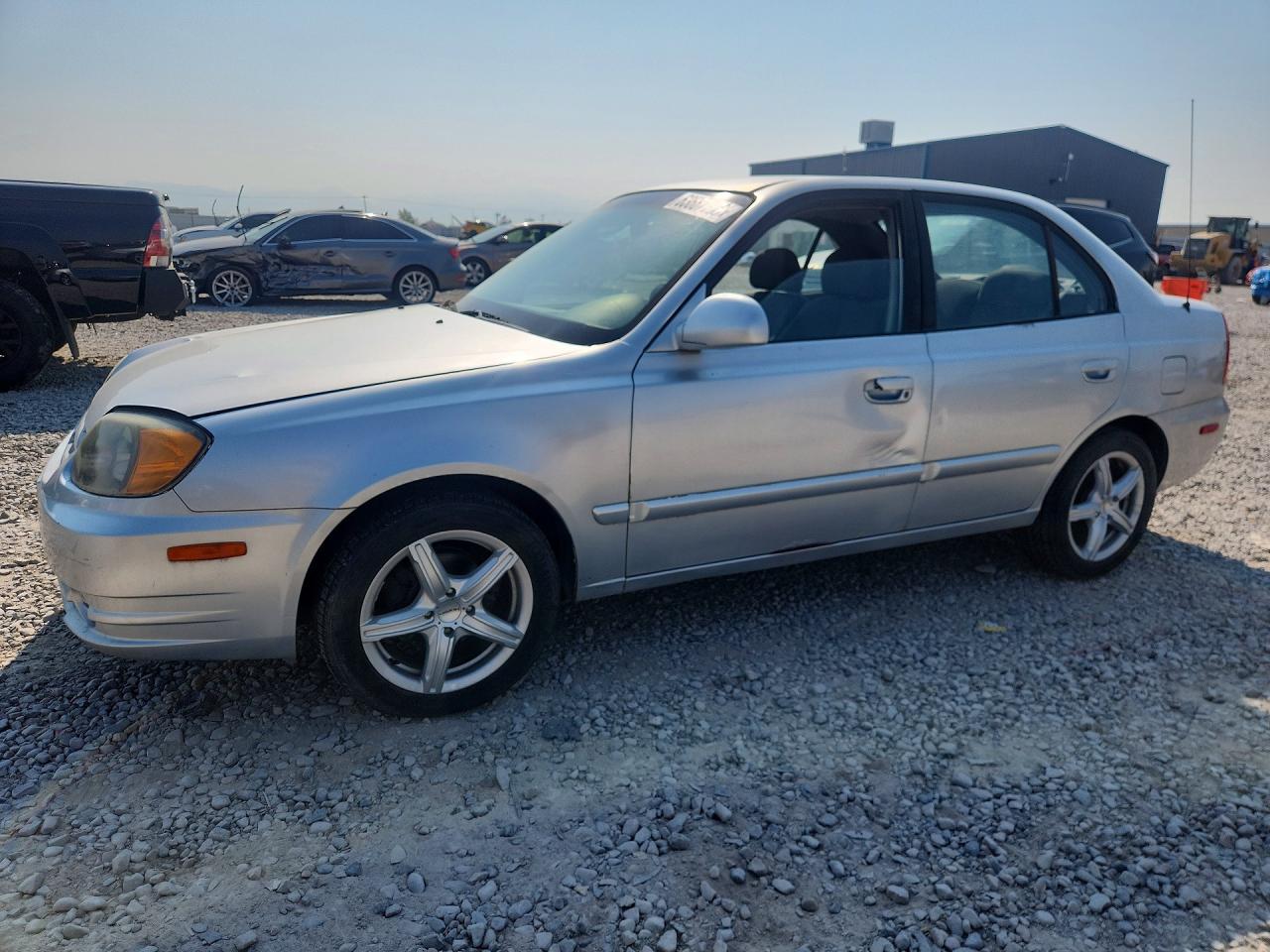 2005 Hyundai Accent GLS, VIN KMHCG45C05U578484 — Бок