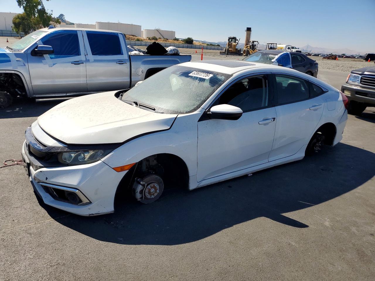 2019 Honda Civic EX-L, VIN 19XFC1F79KE213776 — Vandalism