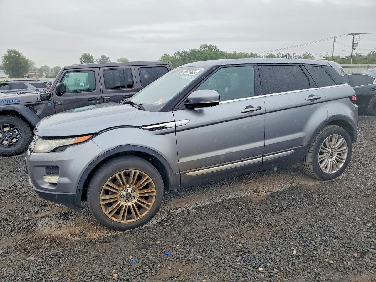 2013 Land Rover Range Rover Evoque Prestige Premium, VIN SALVV2BG3DH773946 — Бок