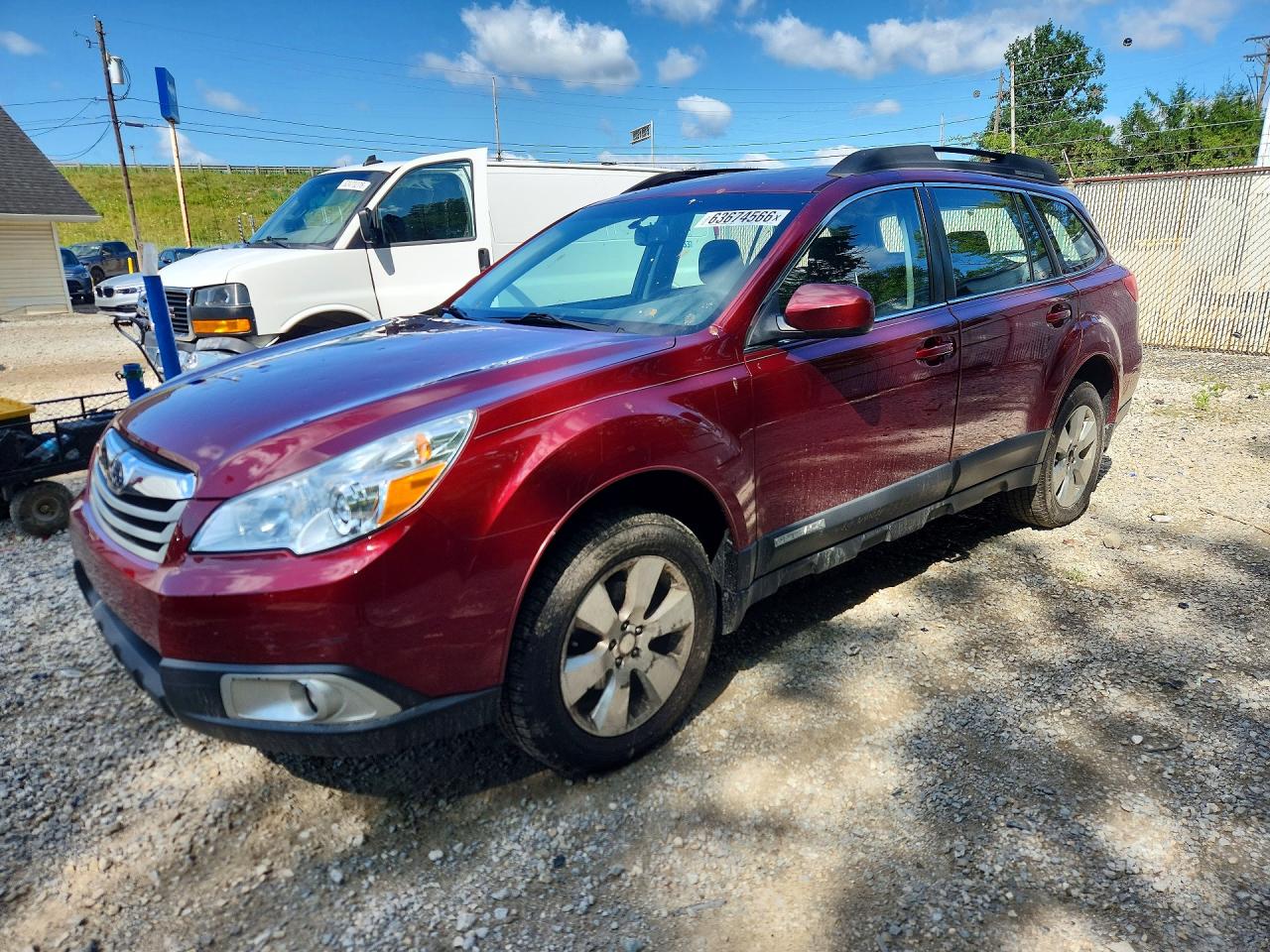 2012 Subaru Outback 2.5i, VIN 4S4BRCAC9C3288107 — Hail