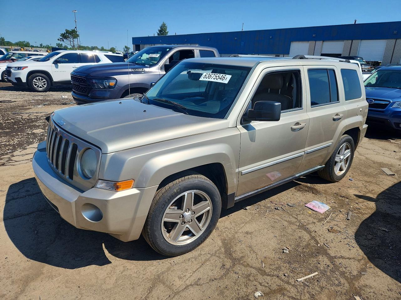2010 Jeep Patriot Limited, VIN 1J4NT4GB6AD562551 — Side
