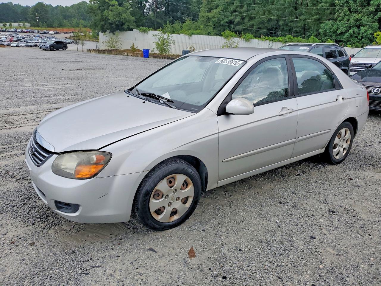 2009 Kia Spectra EX, VIN KNAFE221095590968 — Minor dents and scratches