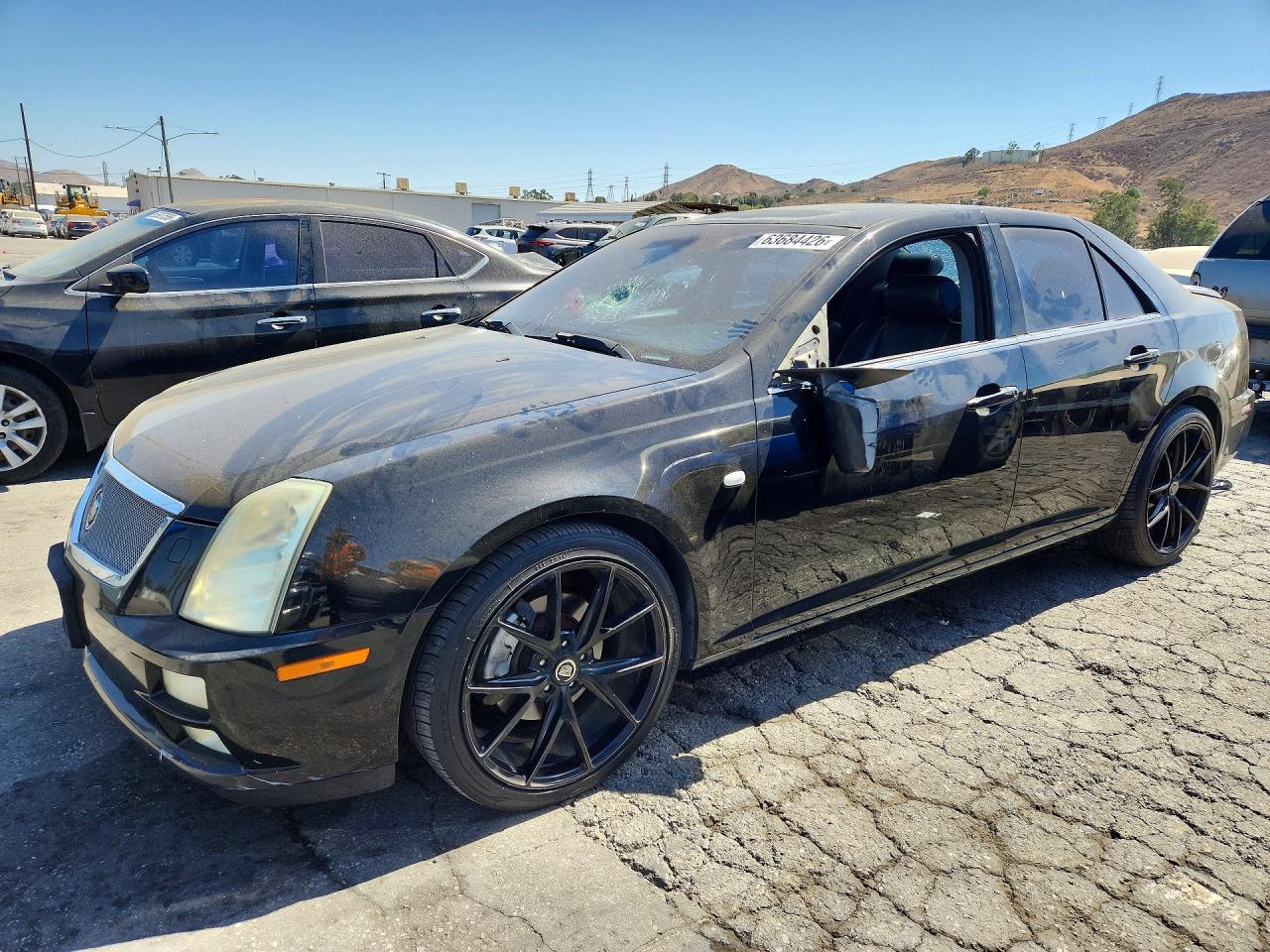 2005 Cadillac STS, VIN 1G6DC67A950170233 — Vandalism