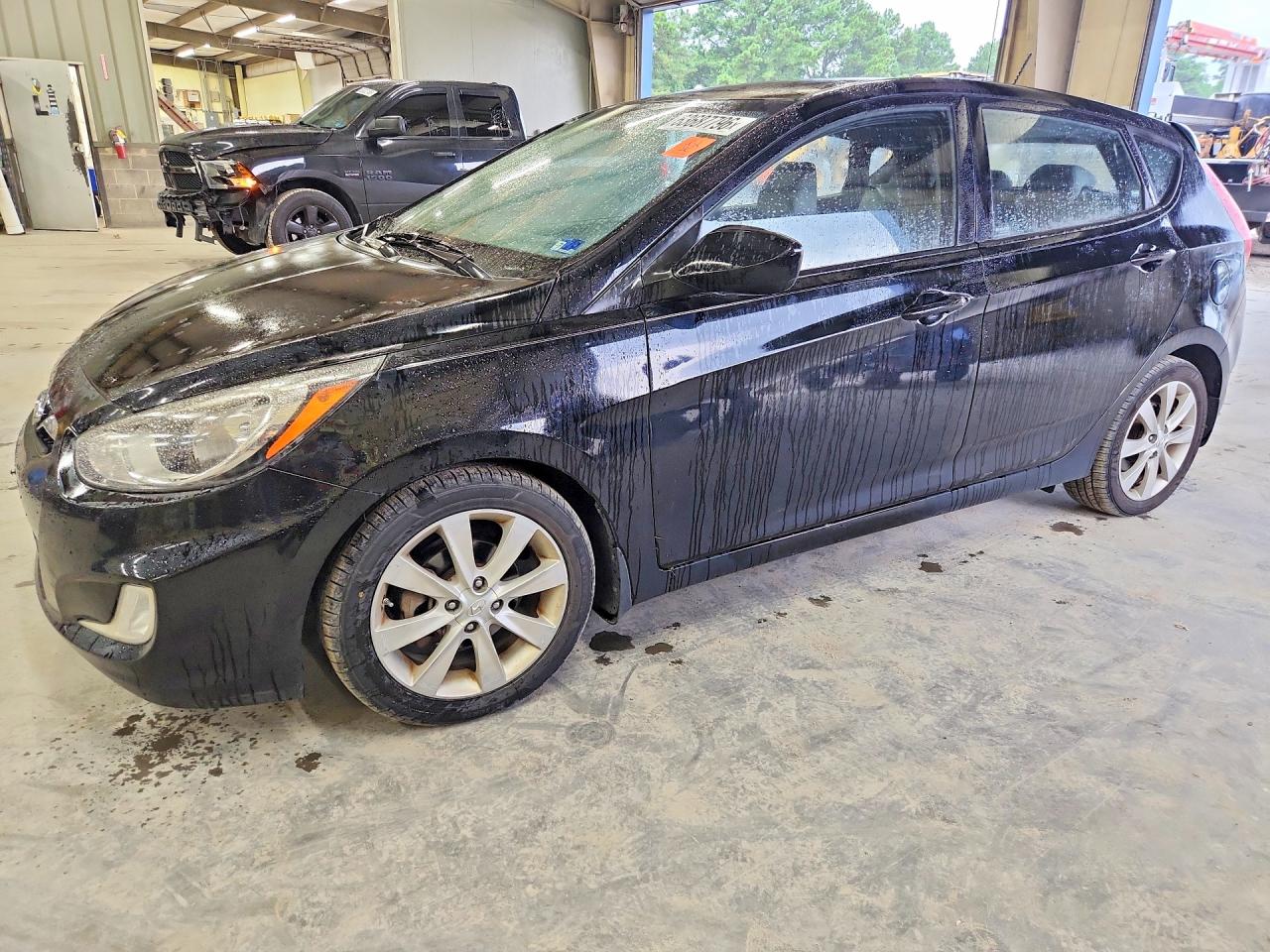 2012 Hyundai Accent SE, VIN KMHCU5AE2CU031493 — Water / flood