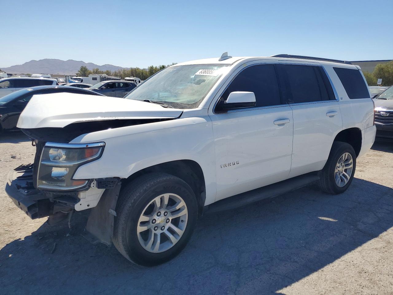 2015 Chevrolet Tahoe LT, VIN 1GNSCBKC3FR550047 — Front end