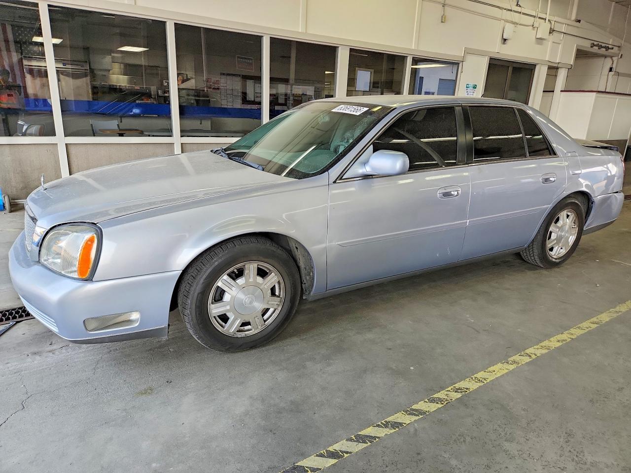 2005 Cadillac DeVille, VIN 1G6KD54Y35U260440 — Rear end