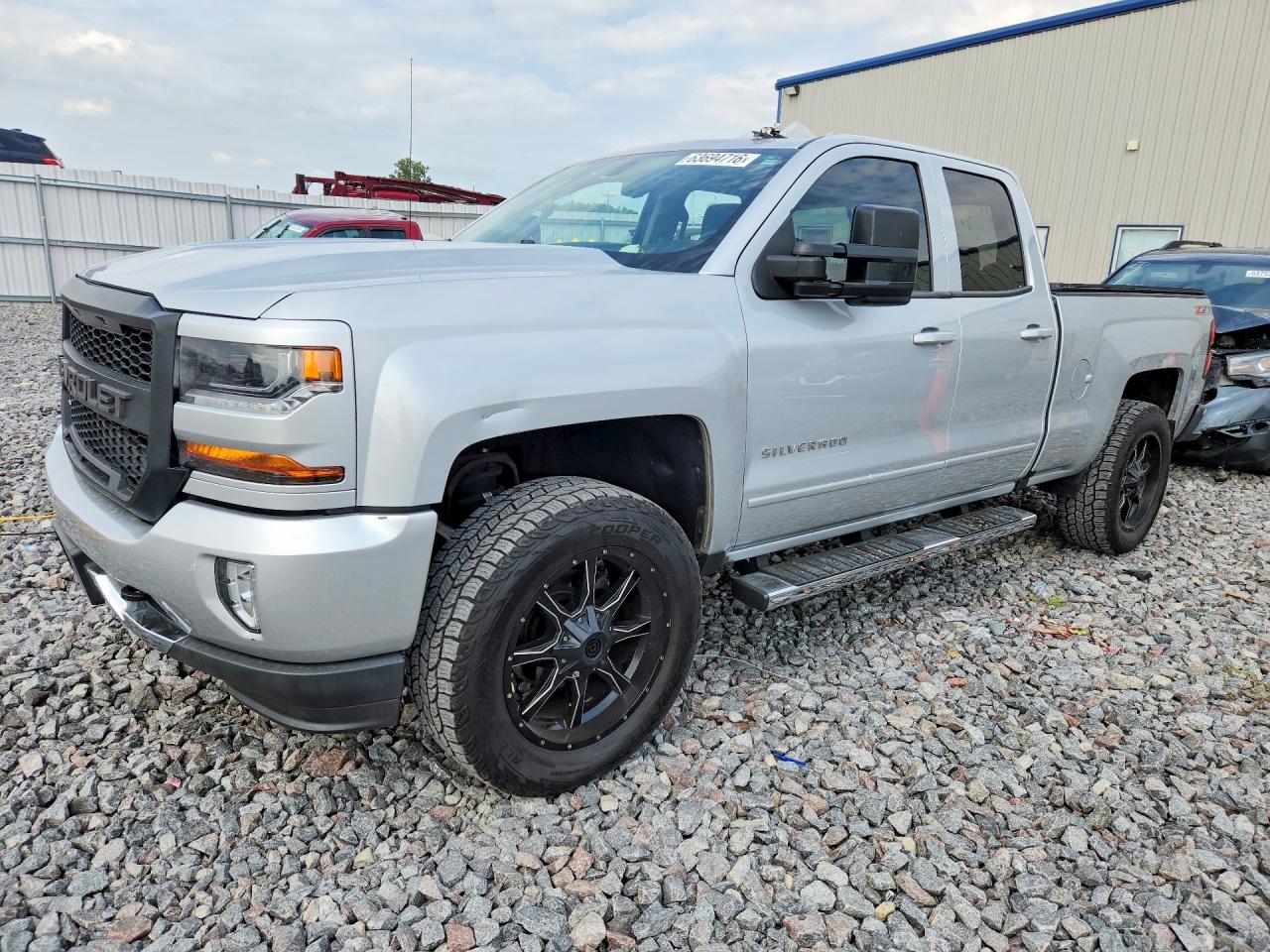 2016 Chevrolet Silverado 1500 LT, VIN 1GCVKRECXGZ250651 — Side