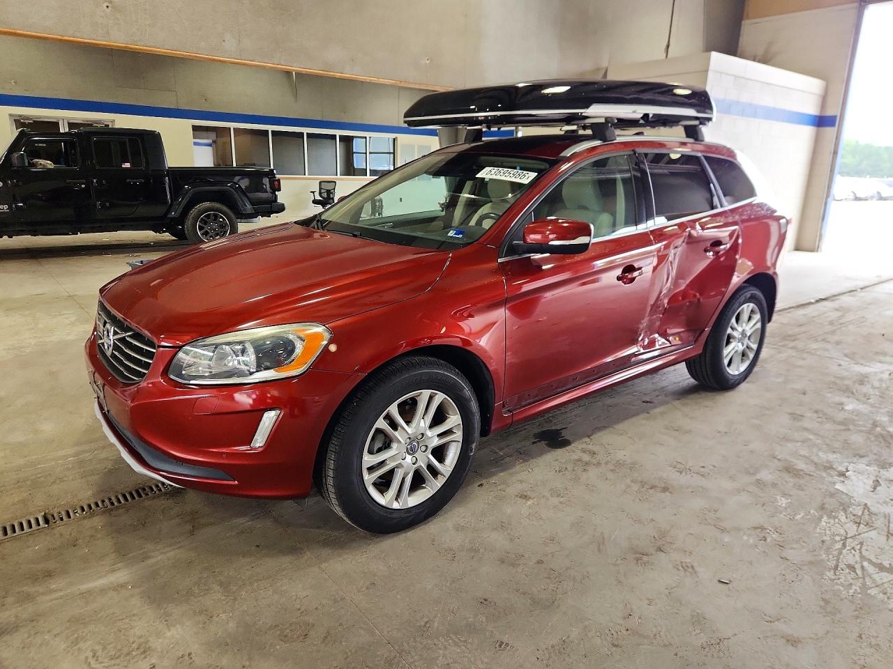 2016 Volvo XC60 T5 Drive-E Platinum, VIN YV440MDM9G2912160 — Side
