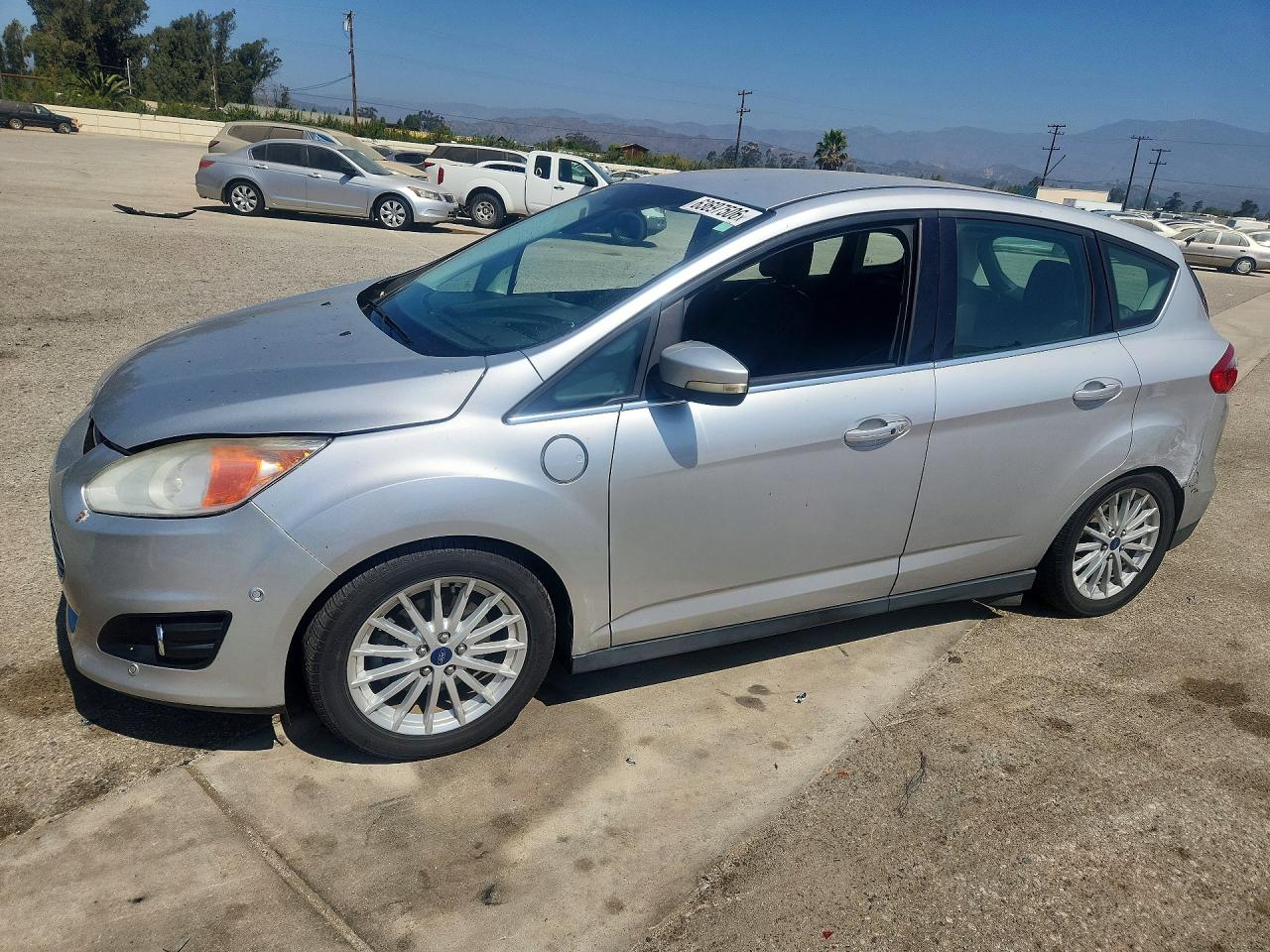 2014 Ford C-Max SEL, VIN 1FADP5CU0EL512989 — Side