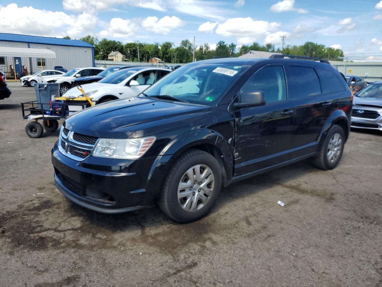 2016 Dodge Journey SE, VIN 3C4PDCAB1GT103302 — Side