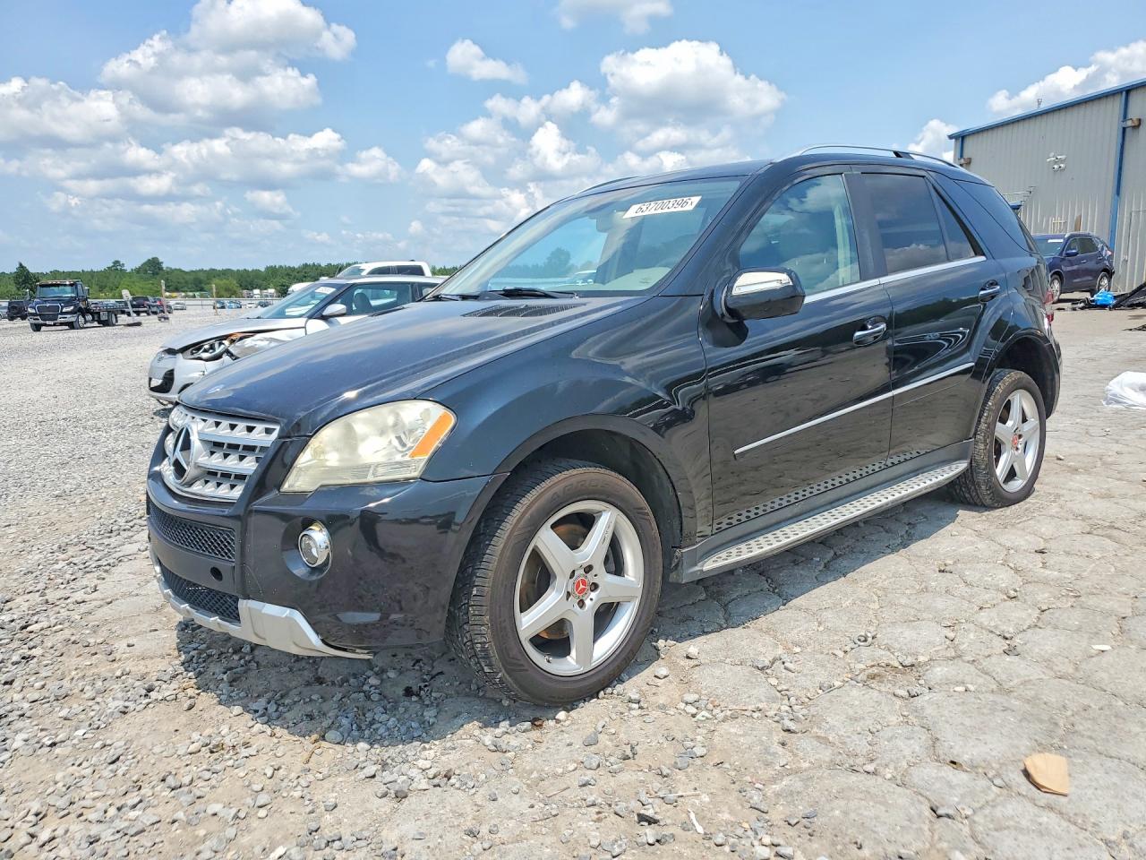 2009 Mercedes-Benz M 550, VIN 4JGBB72E29A487712 — Normal wear