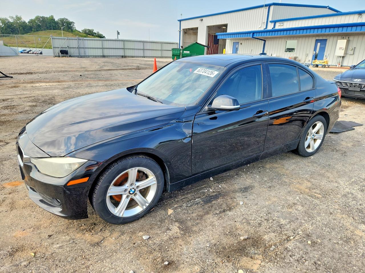 2014 BMW 3 Series 320i xDrive, VIN WBA3C3C51EF984001 — Front end