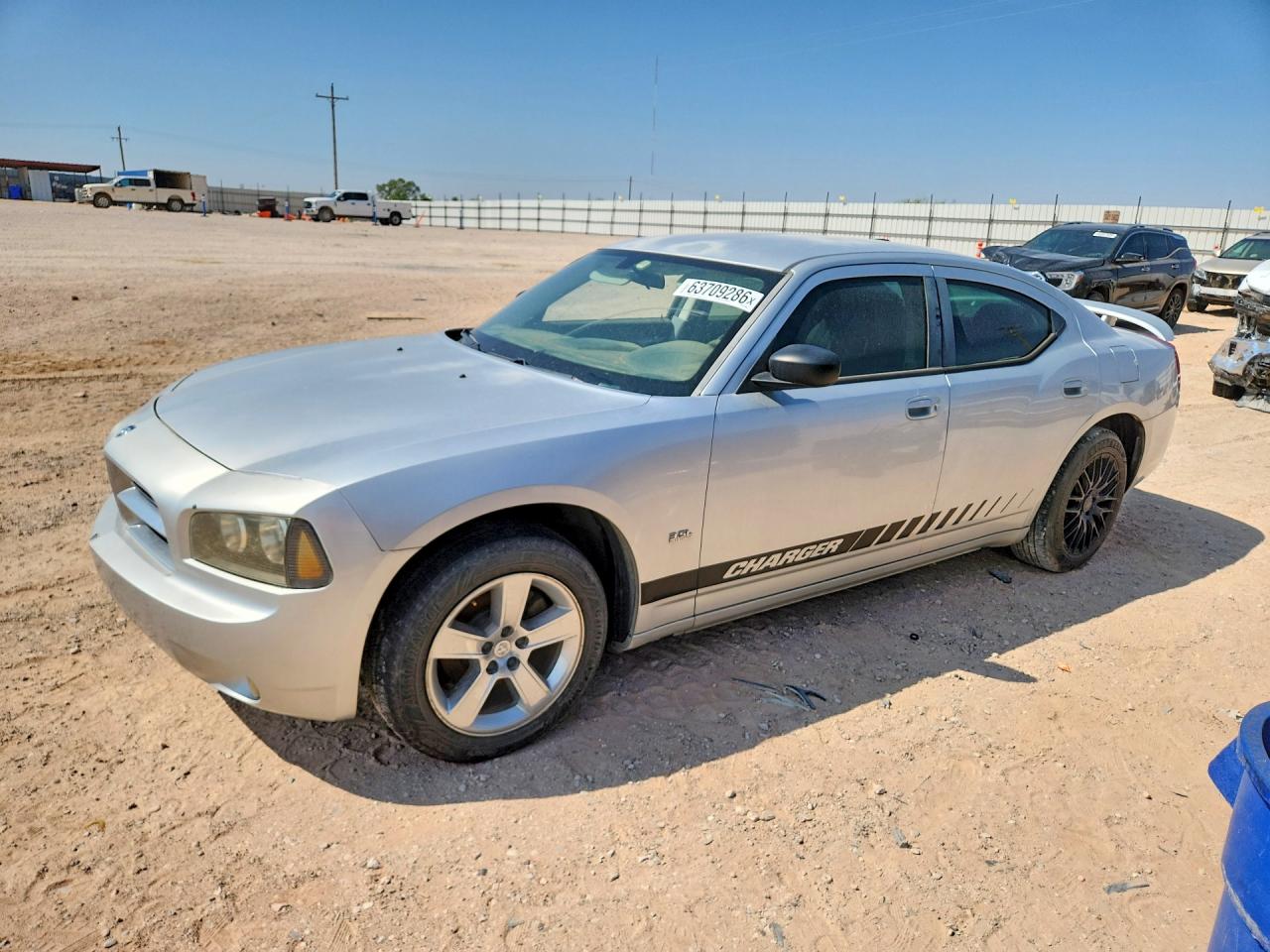 2009 Dodge Charger SXT, VIN 2B3KA33V79H559859 — Мелкие вмятины и царапины